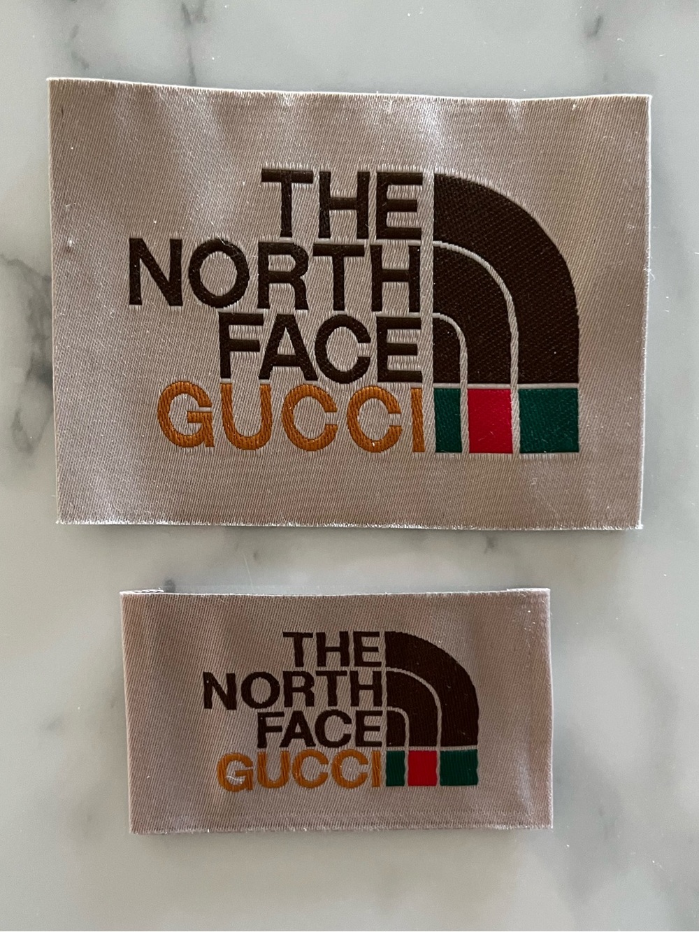 Set of 2 RARE GUCCI x NORTH FACE Logo Tags for clothing/accessory embellishment